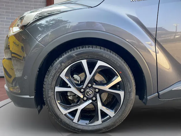 Toyota C-HR 1.8 VVTi HSD Style / frisch ab MFK / 8-fach bereift