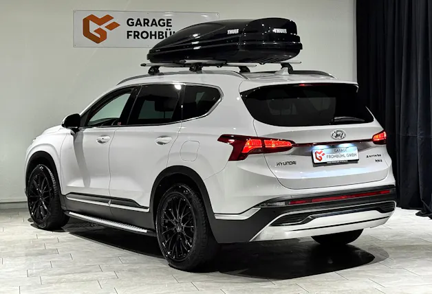 Hyundai Santa Fe 1.6 T-GDi HEV Amplia 4WD Automatic | 1.Hand | Inkl. Dachbox | Werksgarantie |