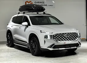 Hyundai Santa Fe 1.6 T-GDi HEV Amplia 4WD Automatic | 1.Hand | Inkl. Dachbox | Werksgarantie |