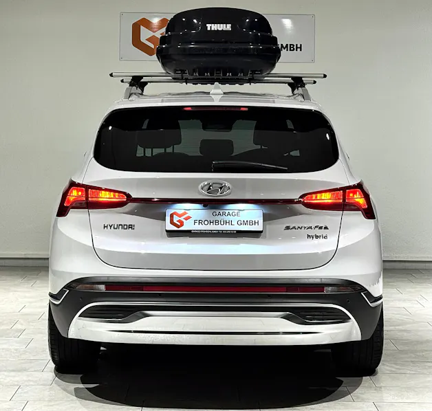 Hyundai Santa Fe 1.6 T-GDi HEV Amplia 4WD Automatic | 1.Hand | Inkl. Dachbox | Werksgarantie |