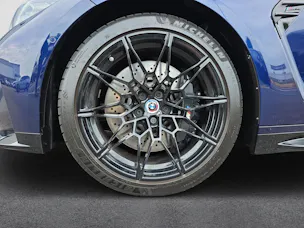 BMW M4 Competition Coupé (CH) Tansanitblau Mét.