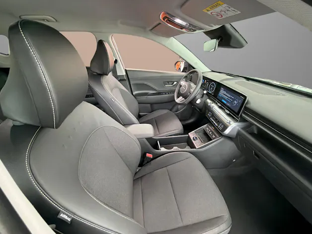 HYUNDAI Kona 65 kWh Electric Amplia + roues d’hiver gratuit
